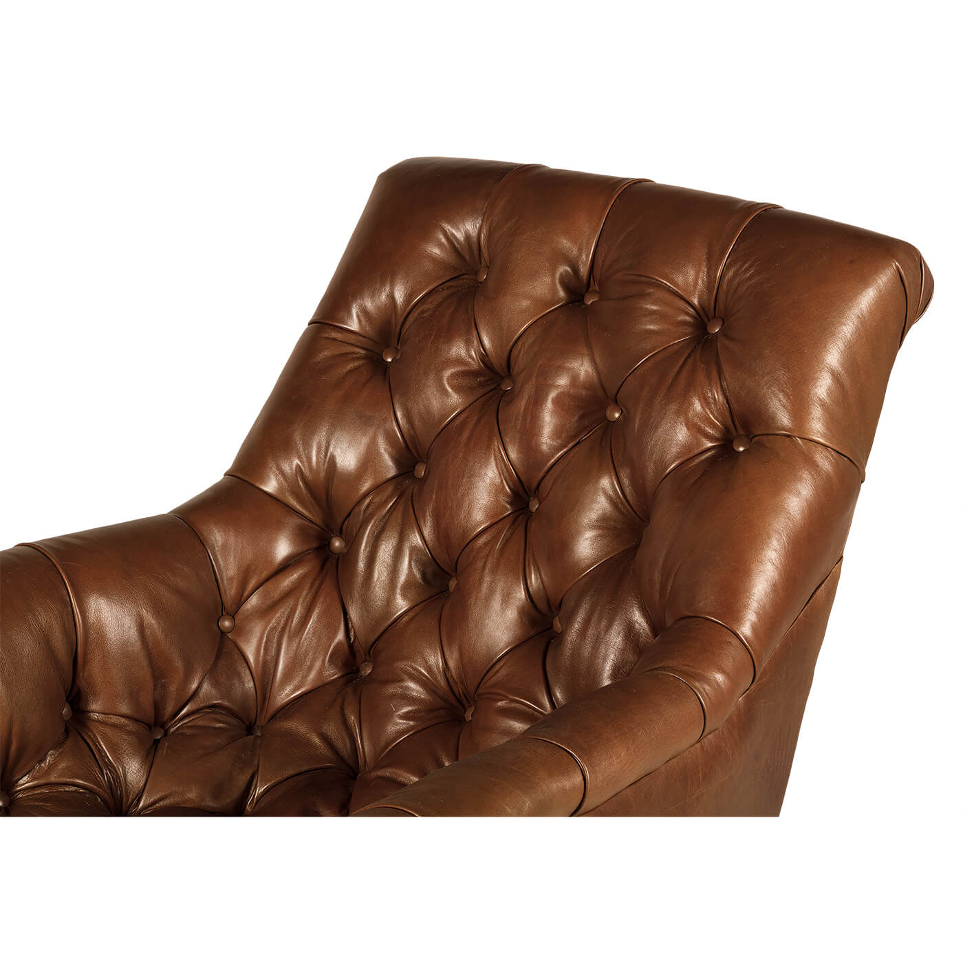 Tufted leather club chair backrest detail, button accents.