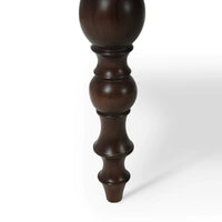 Close-up of table leg detailing.