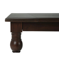 Close-up of table corner and leg detail.