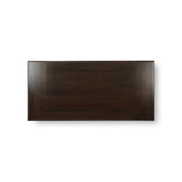 Dark wooden dining table top view.