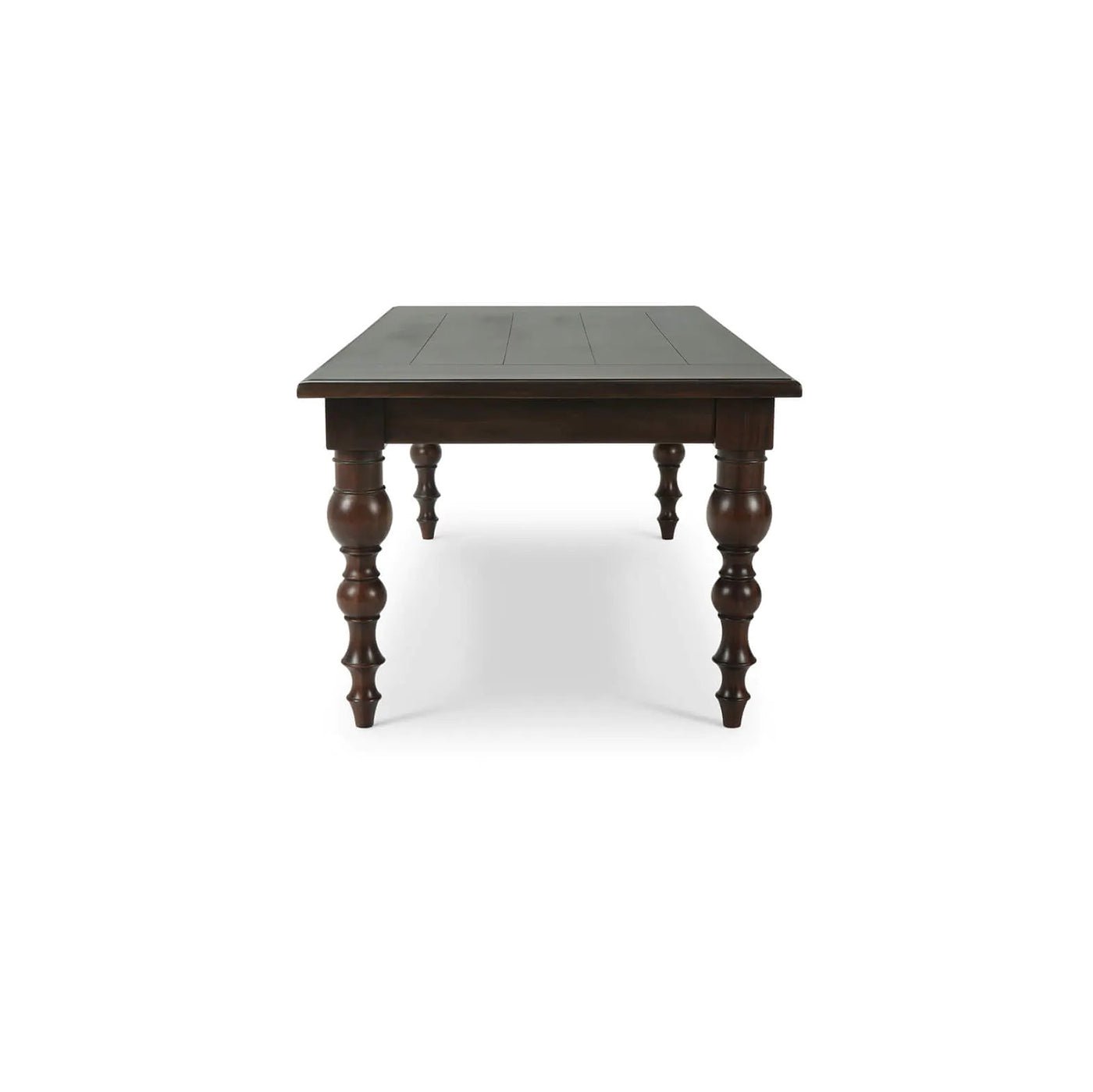 Dark wooden dining table side view.