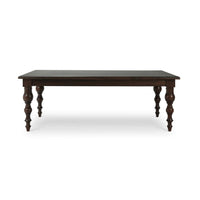 Dark wooden dining table front full view.