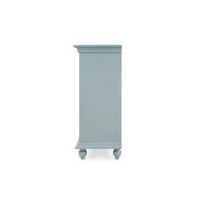 Side profile view of blue credenza.