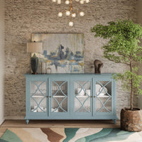 Credenza styled in room, artwork and lamp displayed.