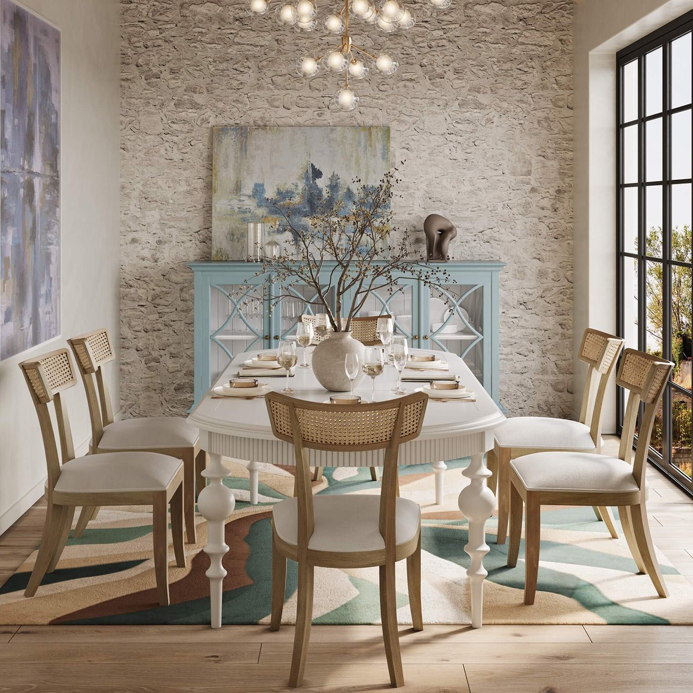 Dining room with credenza in background, table set.