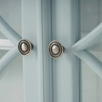 Close-up of credenza handles and door design.