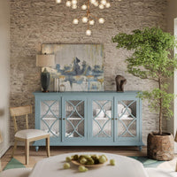 Credenza styled with decor, lamp and art displayed.