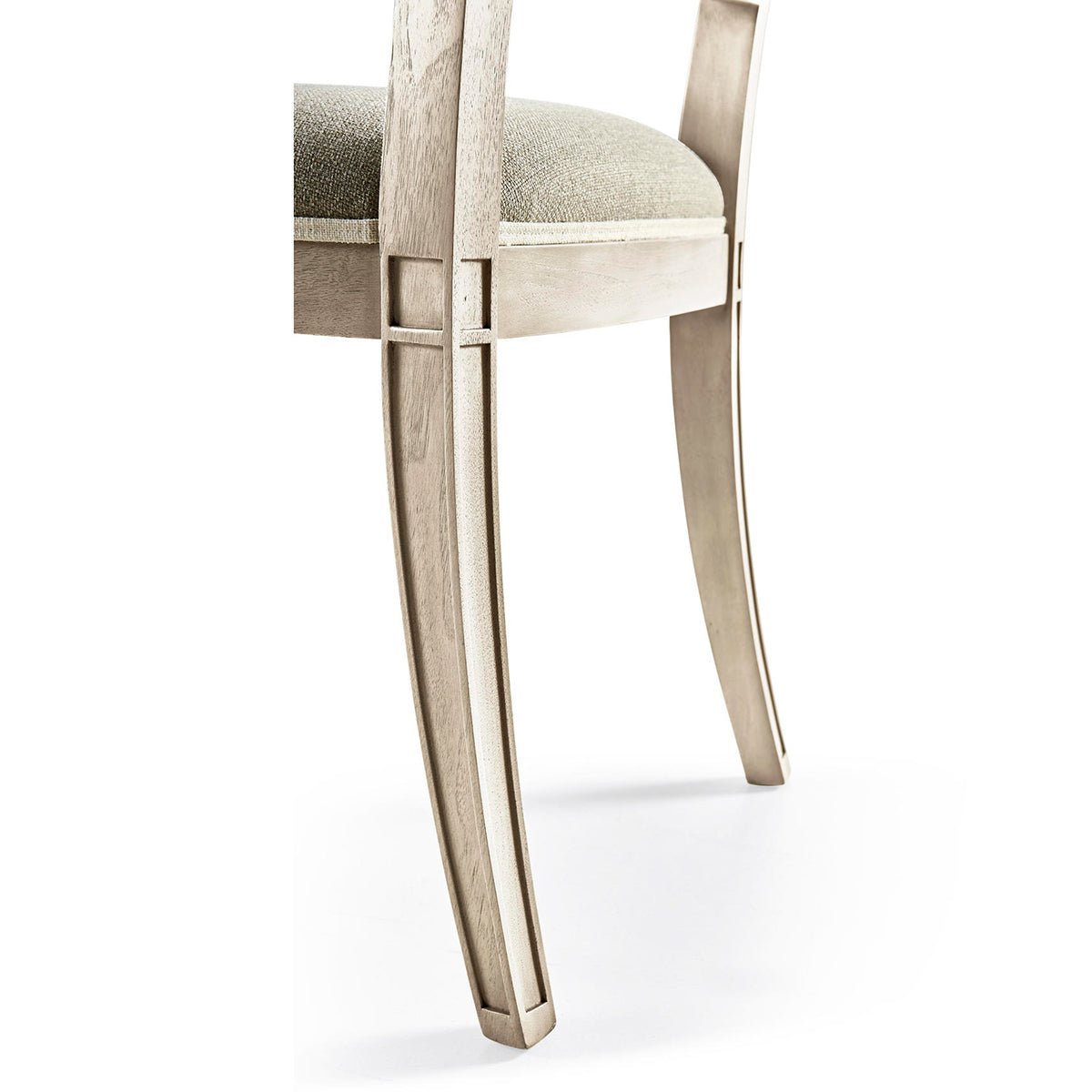 Elegant curve of classic French dining chair legs detail.