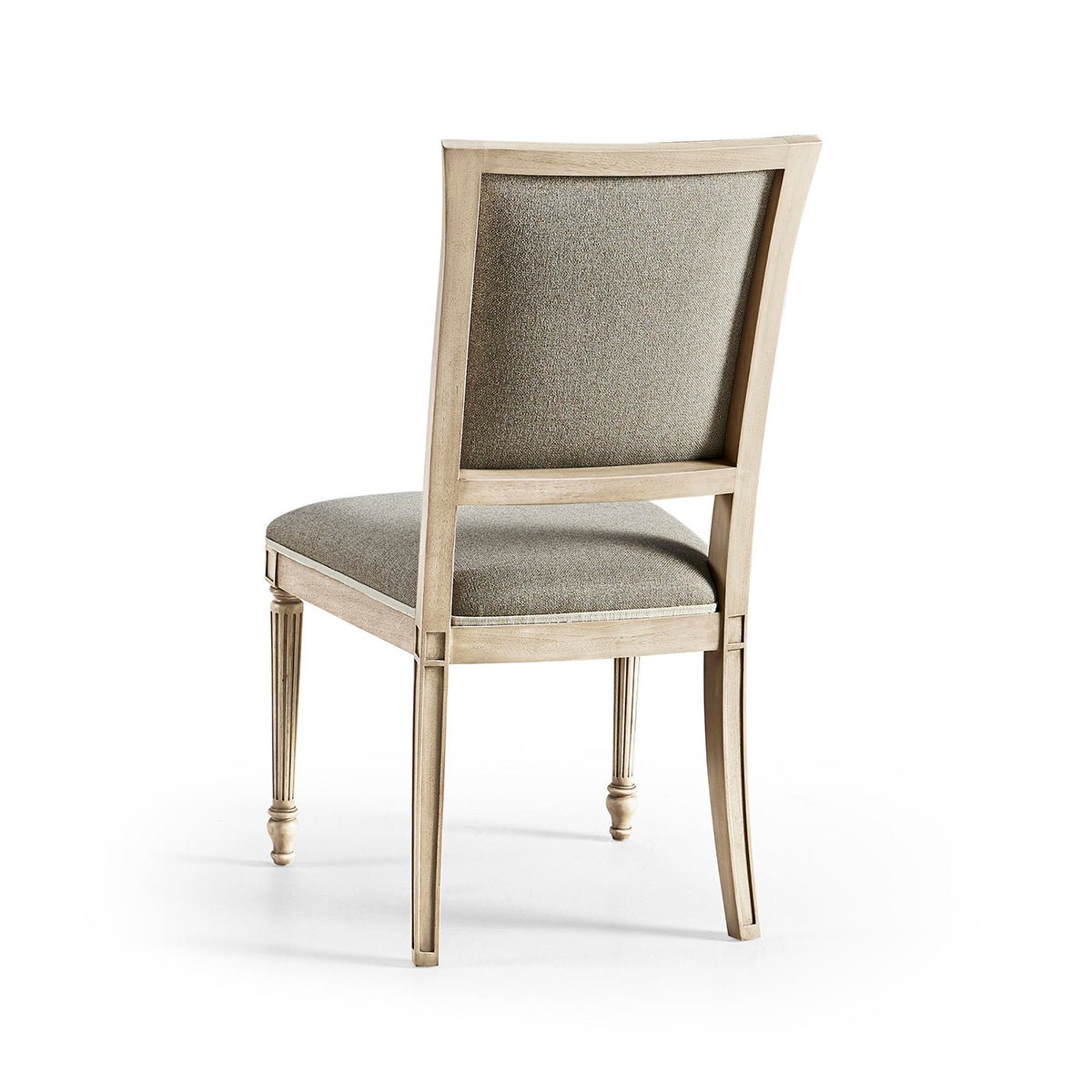Back view of classic French dining chair with cushion.