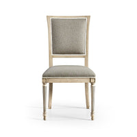 Front view of elegant classic French dining chair.