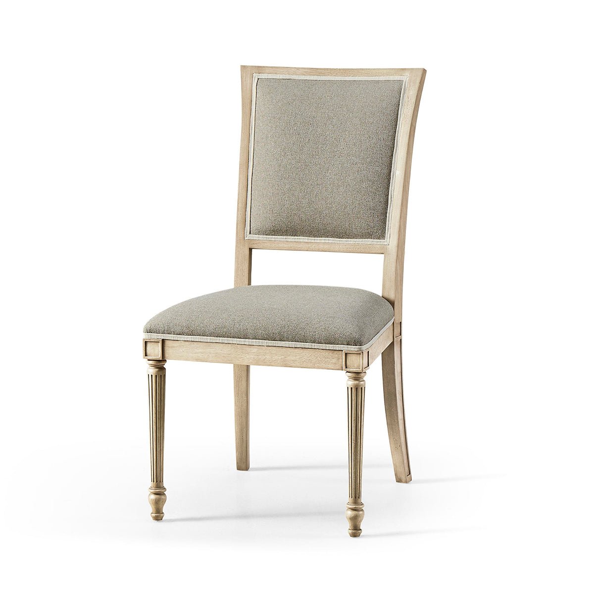 Side view of classic French dining chair with upholstery.