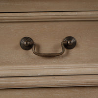 Close-up of handle on classic French small credenza drawer