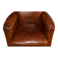 Overhead view of brown leather armchair seat.