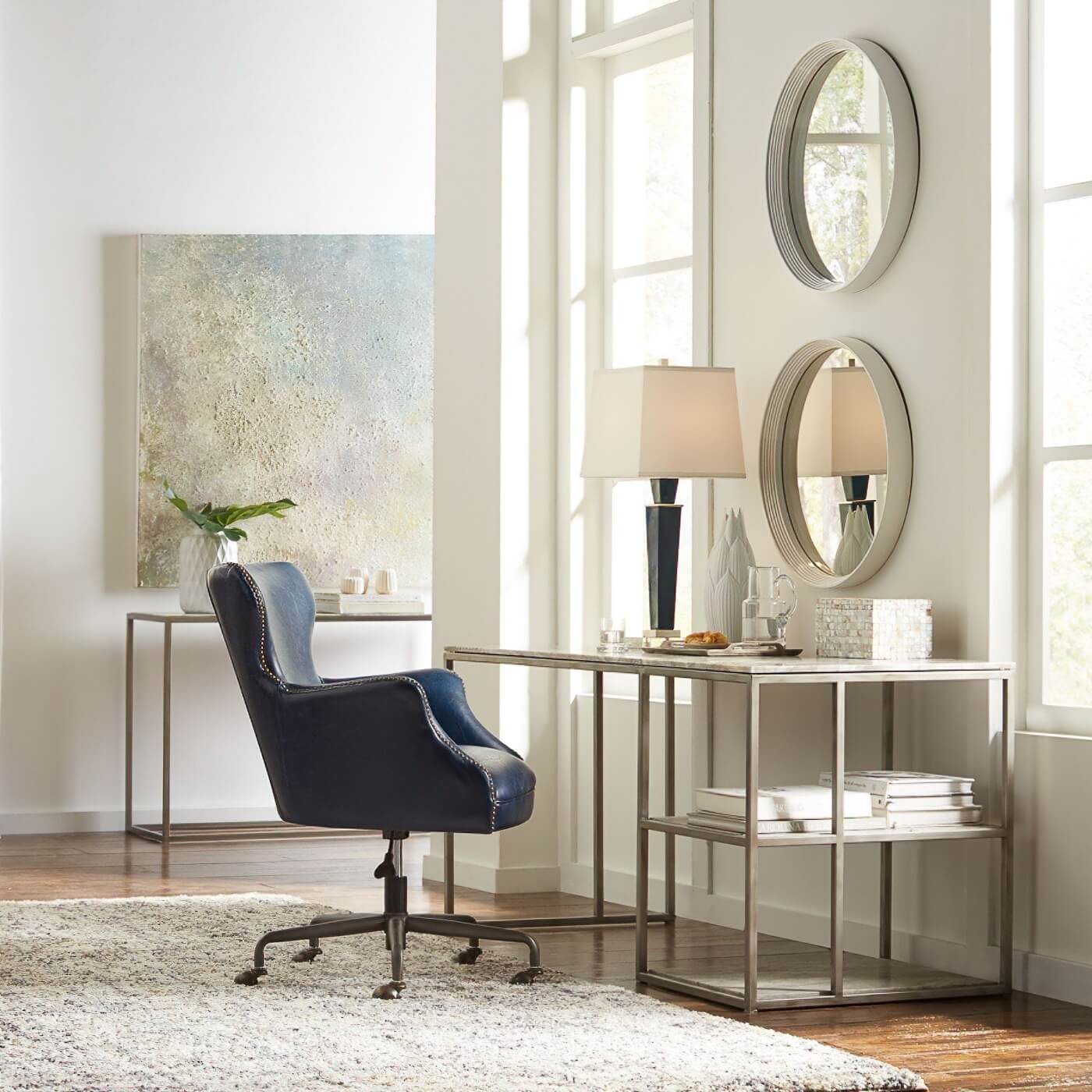 Blue leather office chair in home office setting.