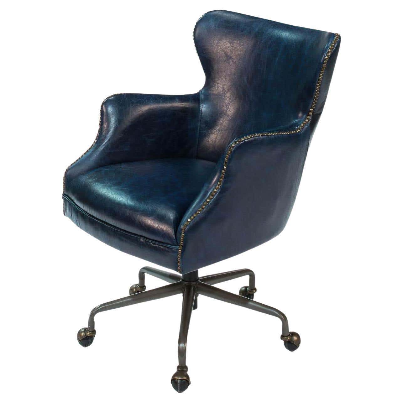 Blue leather office chair side angle view.