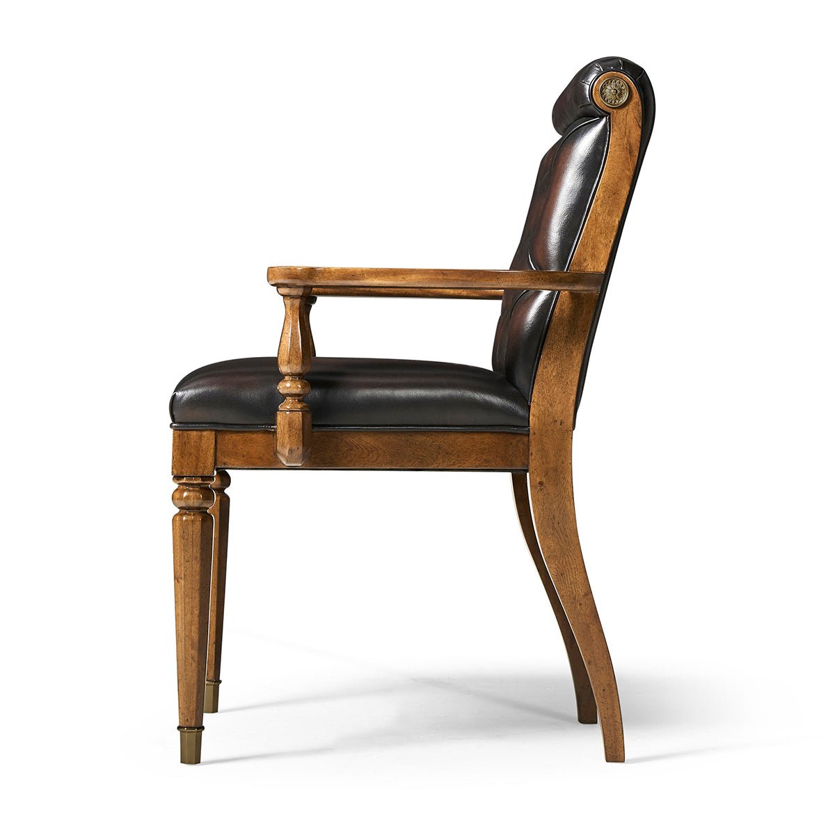 Leather tufted dining armchair side profile.