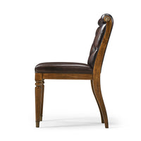 Side profile, intricate details of classic tufted dining chair.