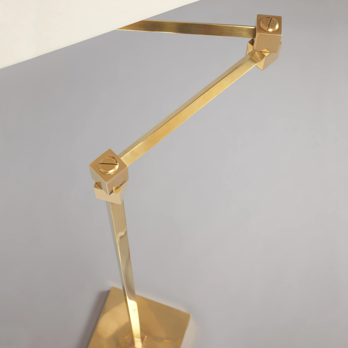 Top view of brass swing arm floor lamp.