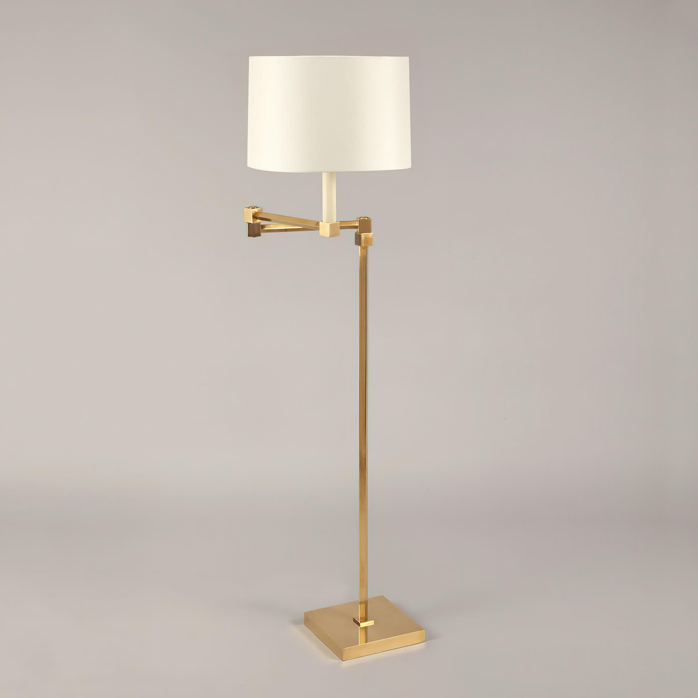 Modern brass floor lamp, front view.