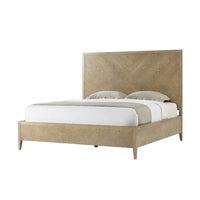 Light wood frame bed with mattress and pillows.