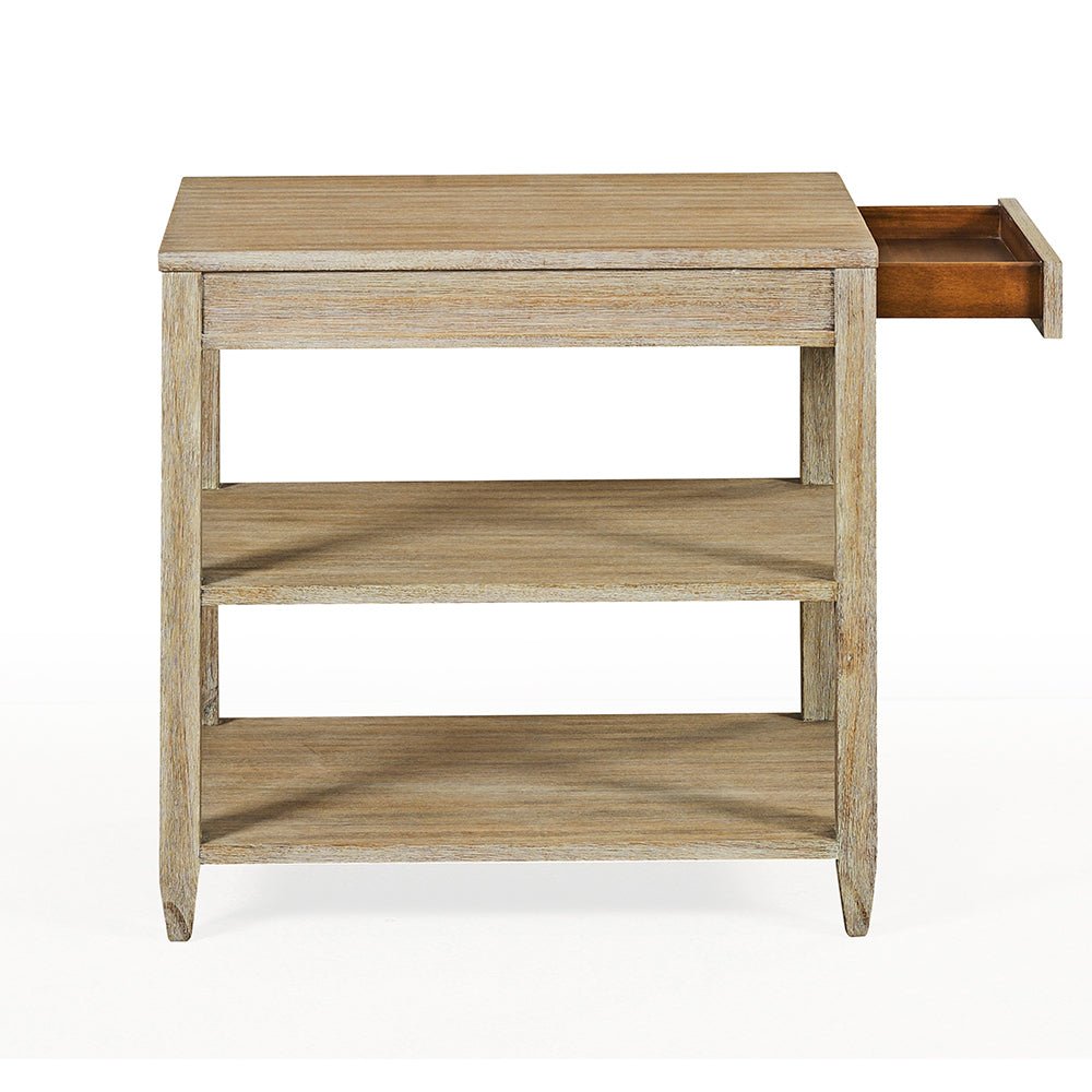 Side table with extended drawer, weathered wood texture.