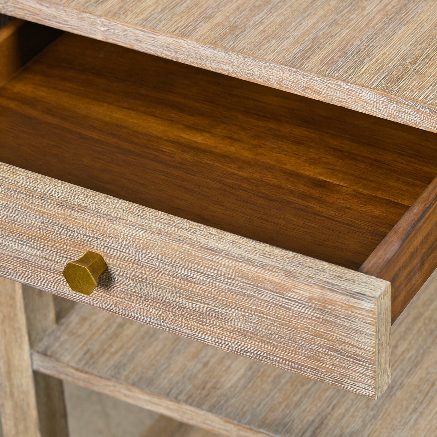 Close-up of side table drawer handle and interior.