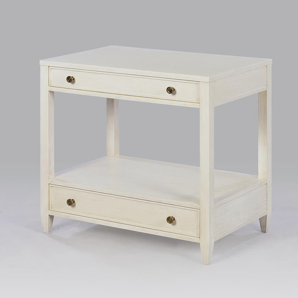 Drift white nightstand angled view with drawers shut.
