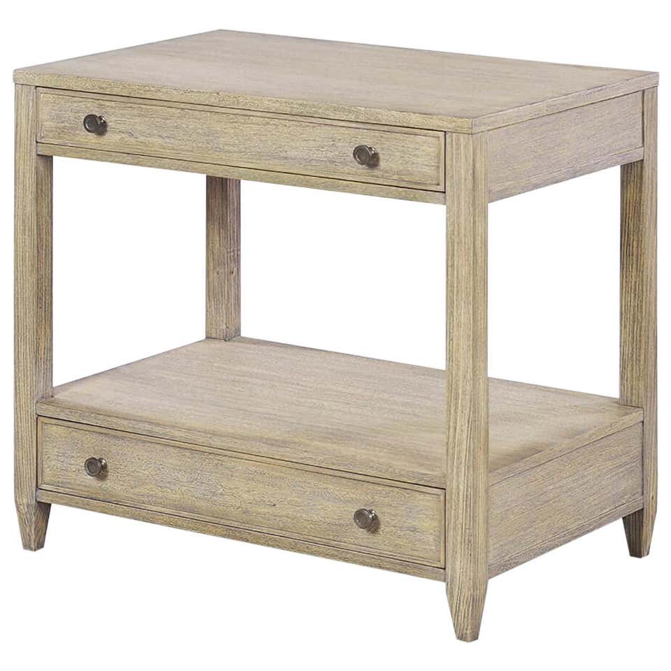 Classic nightstand in greyed wood with two drawers.