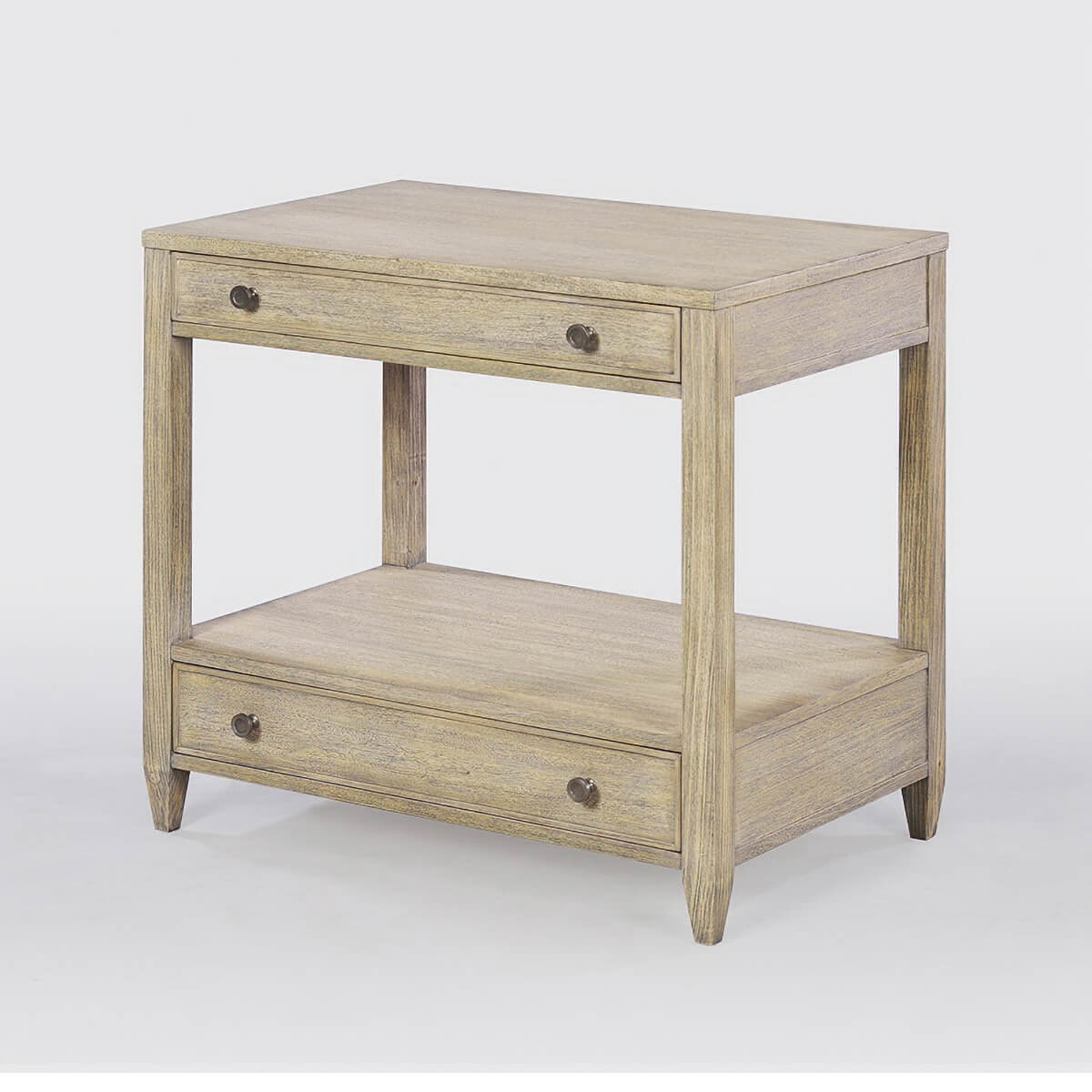 Side view of greyed nightstand, closed drawers visible.