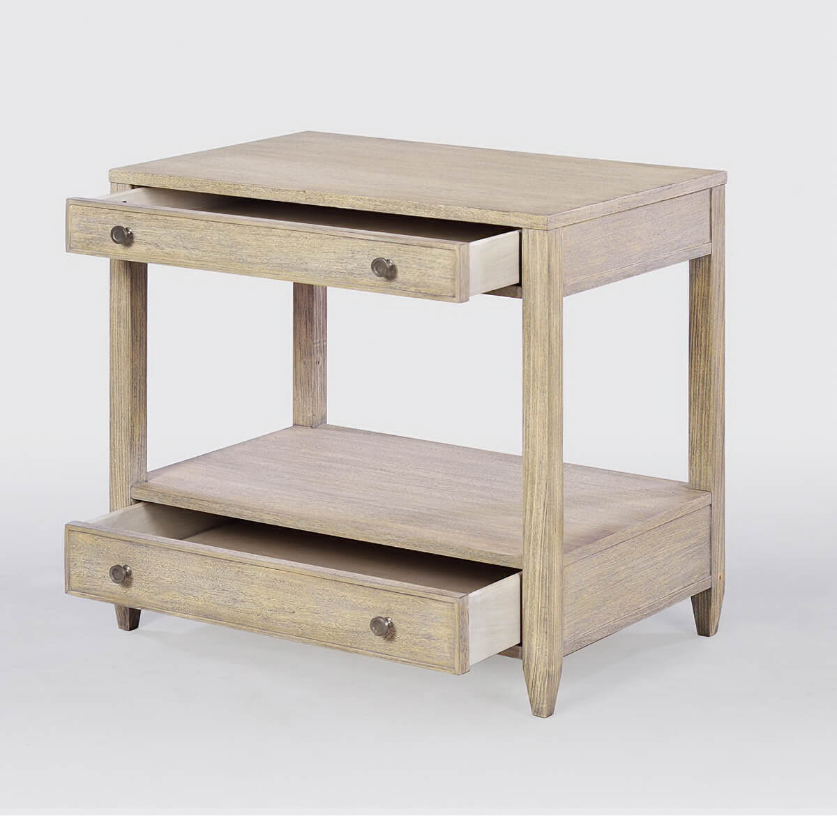 Greyed nightstand with open drawers showcasing storage.