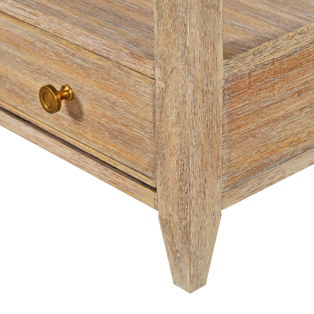 Nightstand corner detail, leg and knob close-up.