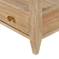 Nightstand corner detail, leg and knob close-up.