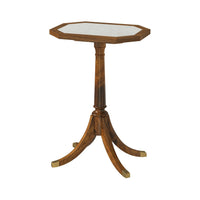 Octagonal marble top accent table on white background.