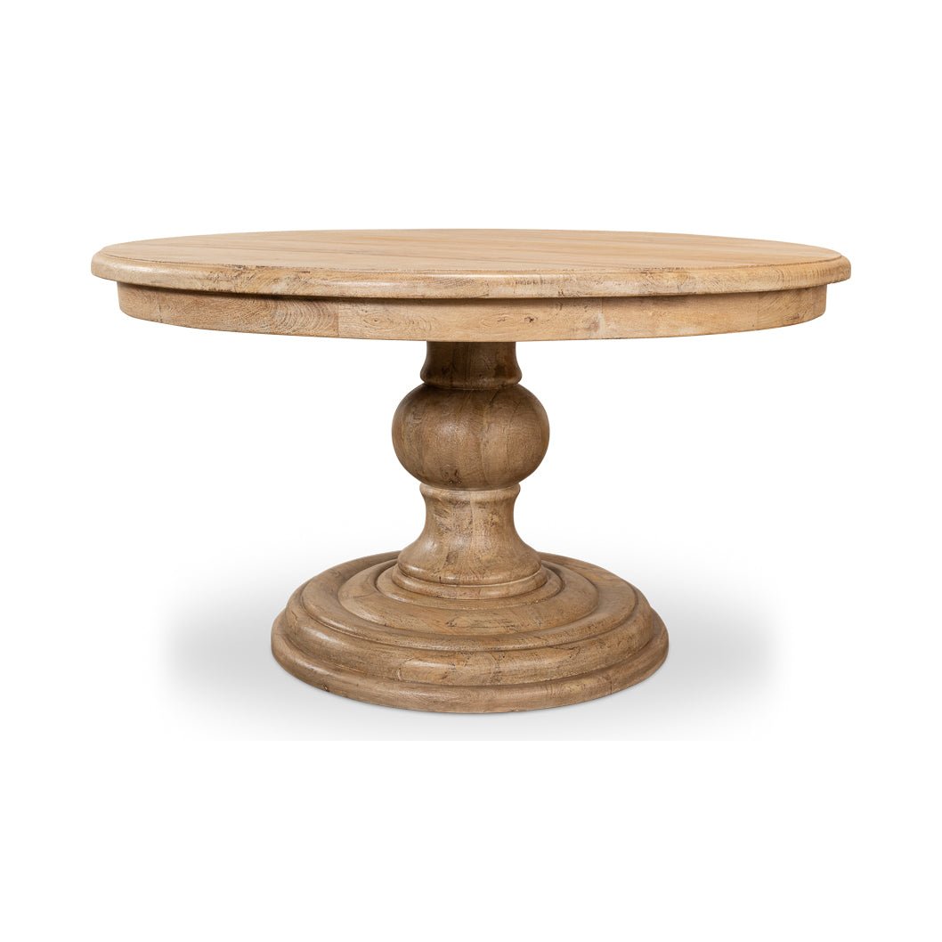 Pedestal base dining table side perspective view.