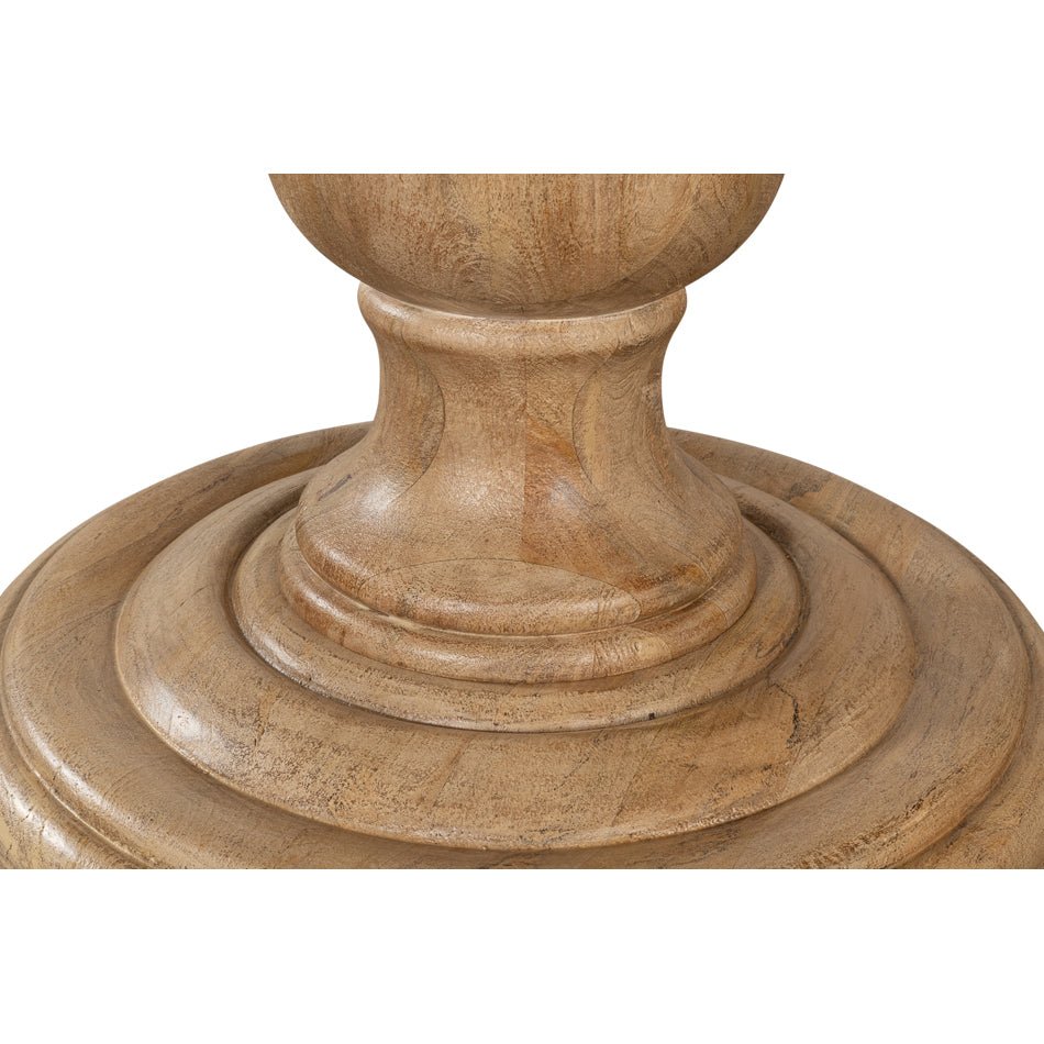 Close-up of pedestal base detail on dining table.