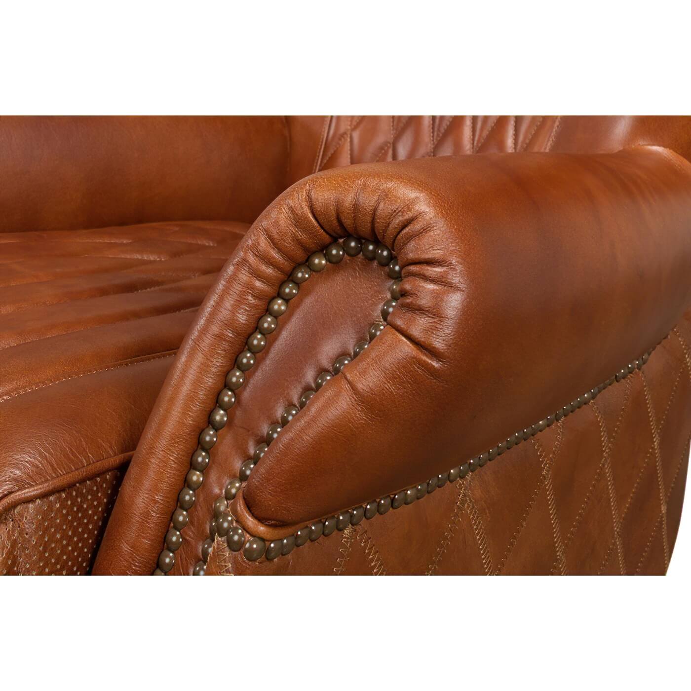 Close-up of armchair's armrest and nailhead trim.