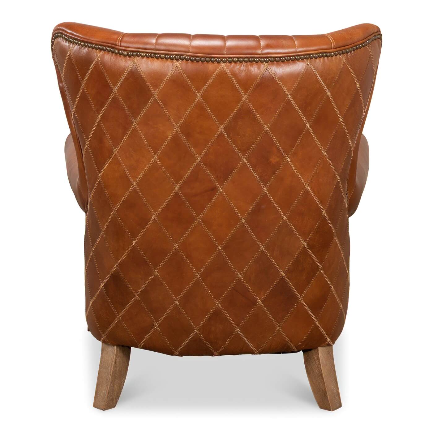 Back view of quilted brown leather armchair.