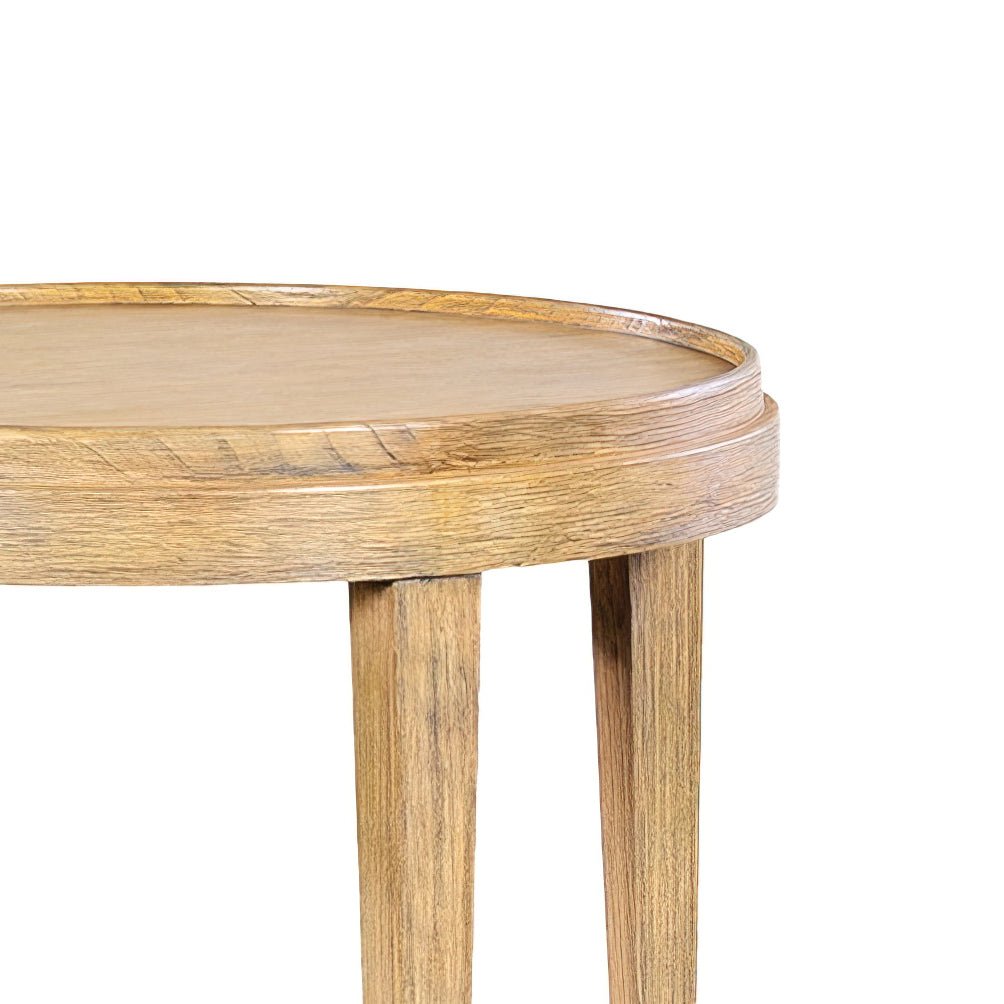 Close-up of round end table, edge design, wood texture.