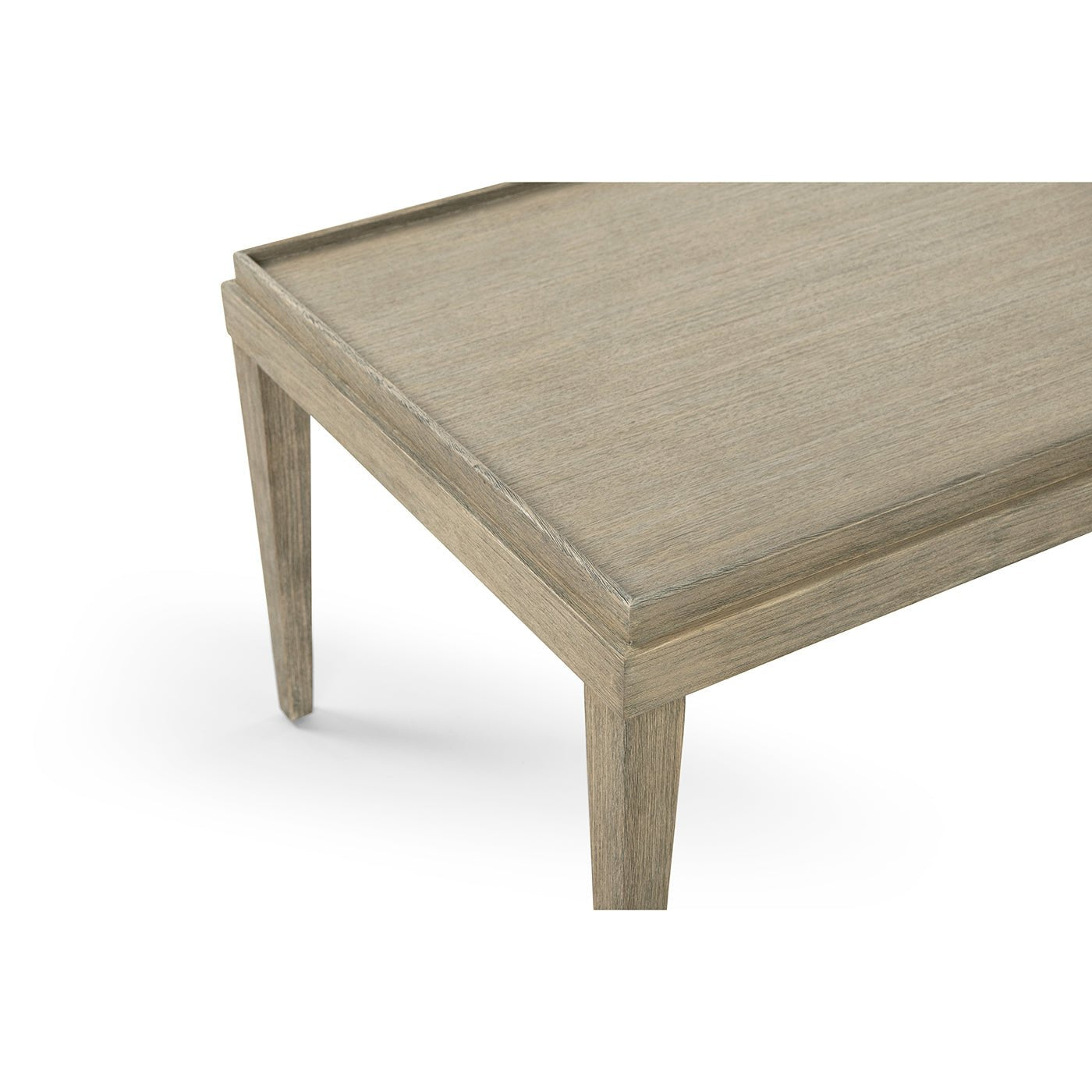 Close-up corner of rustic coffee table.