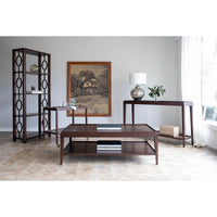 Dark wood rectangular coffee table in styled interior.