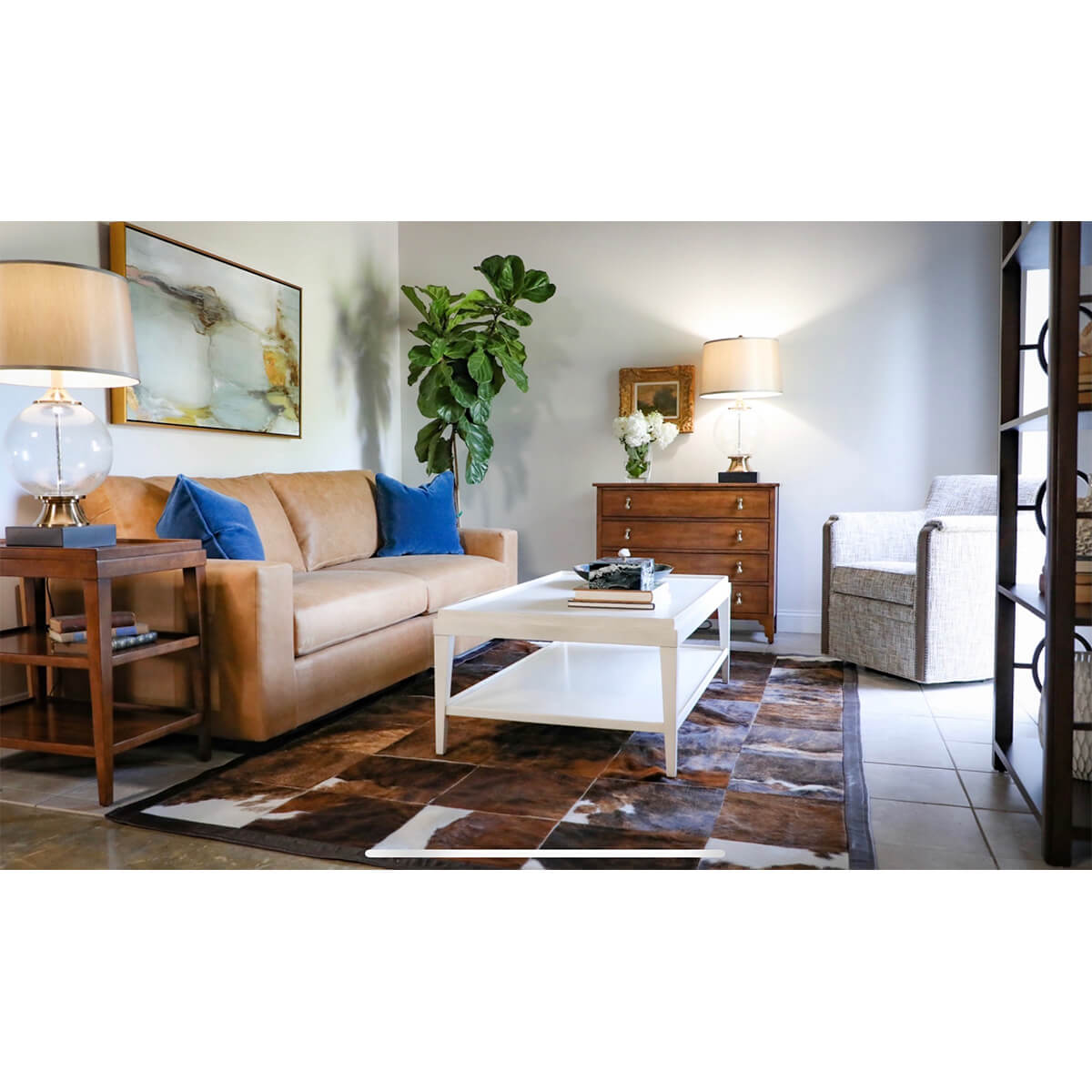 White lacquer coffee table in living room setup.