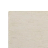 Close-up on tabletop texture, drift white side table.