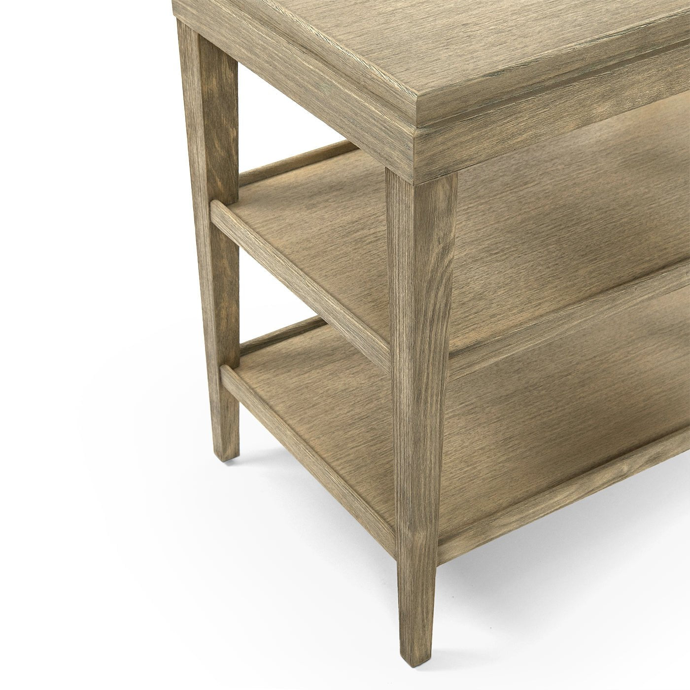 Close-up of legs on three-tier side table.