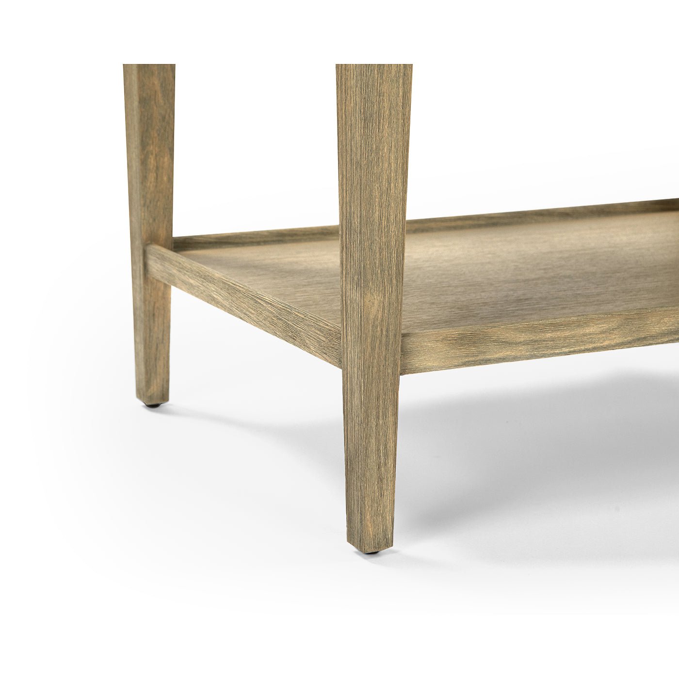 Close-up of leg base on three-tier side table.