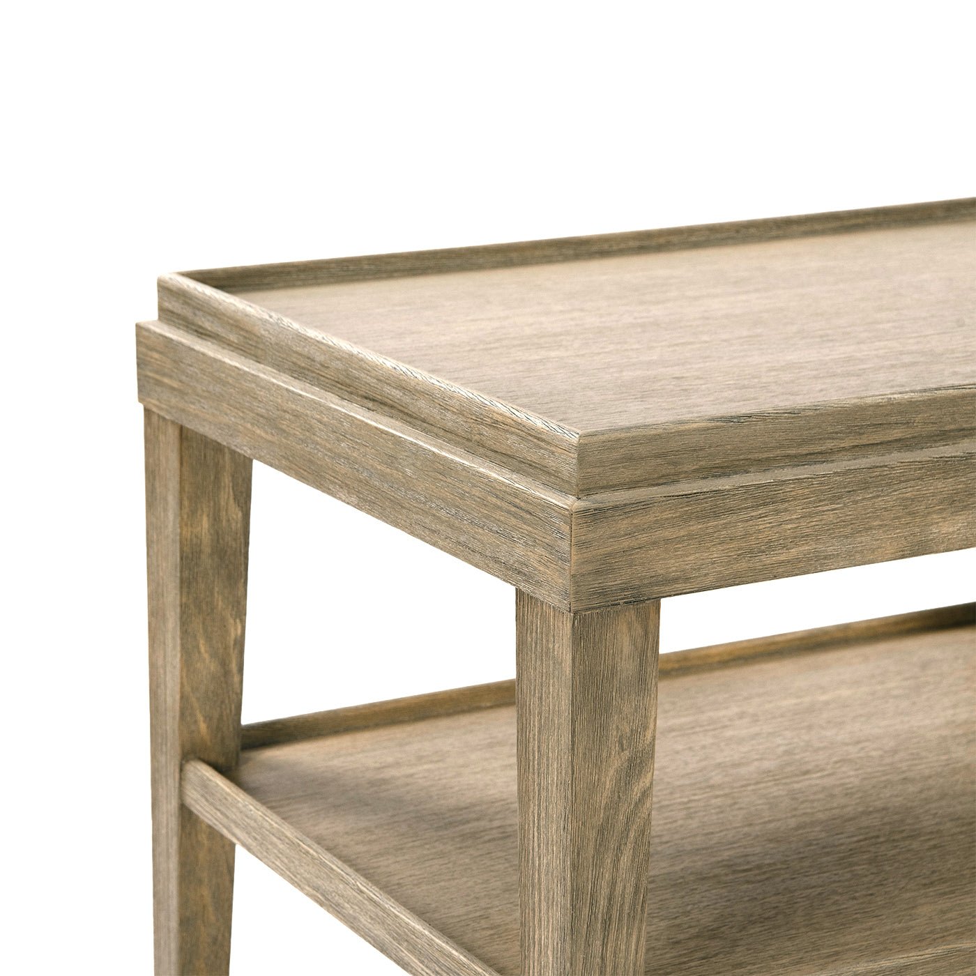 Close-up of top corner of three-tier side table.