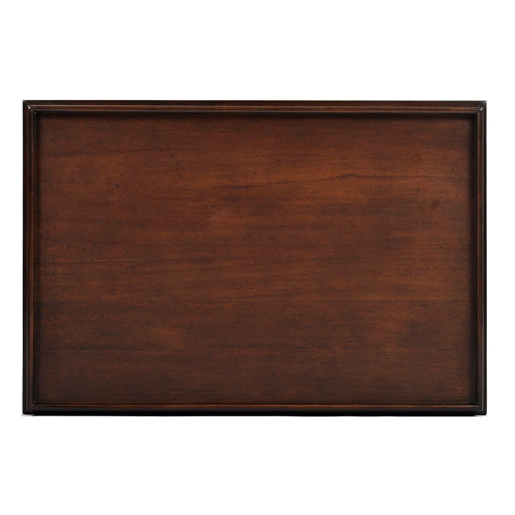 Top view of mahogany side table displaying detail.
