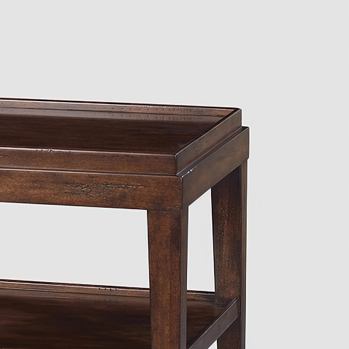 Close-up of side table corner and top design.