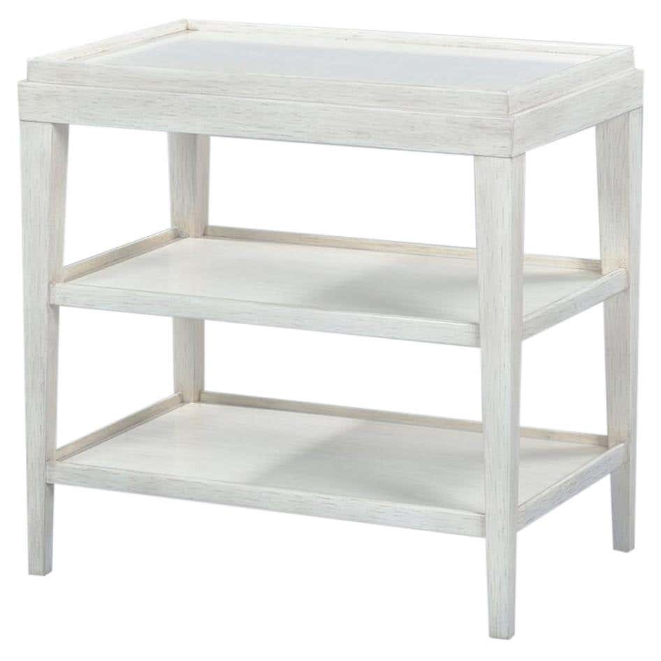 Rustic white three-tier side table front view.