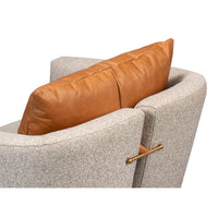 Back view of classic tub chair with pillow detail.
