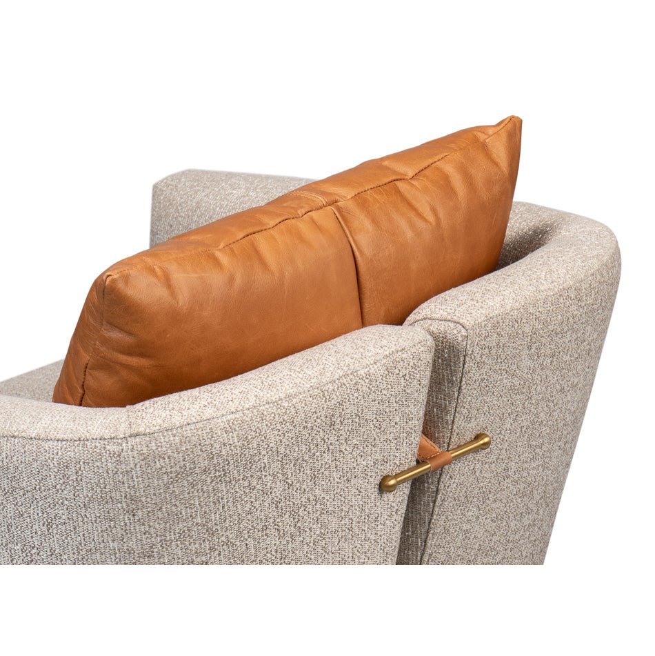 Brown cushion detail on swivel chair, back view handle.